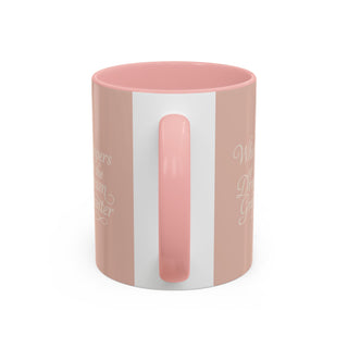 Pink and white mug with text on a white background